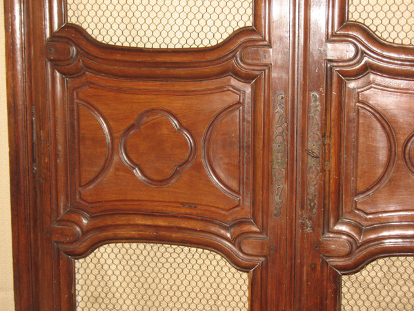 Facade of woodwork or library doors in walnut, late 18th century, Louis XIV style
