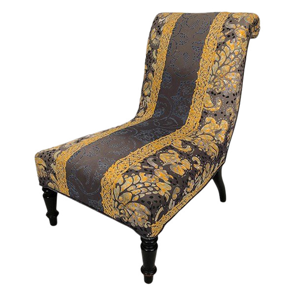 Low chair with moving backrest, blackened wooden legs. Napoleon III period