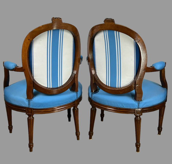 PAIR OF 18th CENTURY ARMCHAIRS FROM LOUIS XVI PERIOD IN CARVED MOLDED/UPPHONED WALNUT