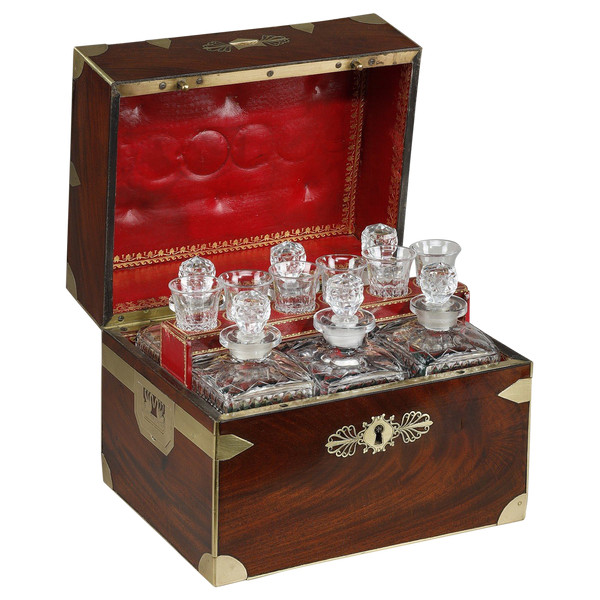 FLAMED MAHOGANY LIQUEUR CELLAR WITH CUT CRYSTAL BOTTLES AND GLASSES