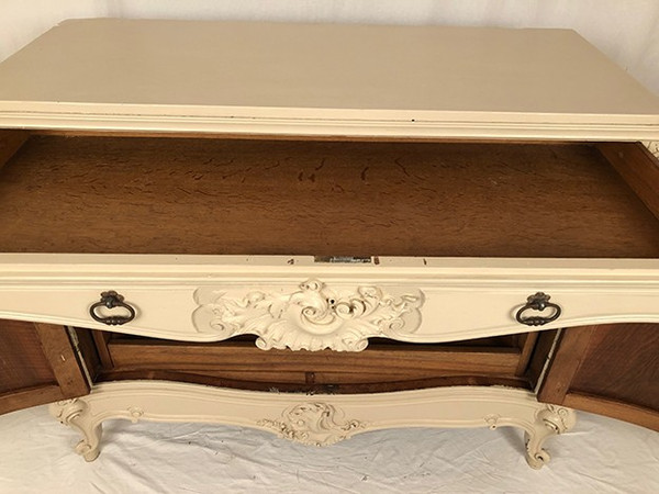 Low rocaille style sideboard in cream lacquered wood, circa 1900