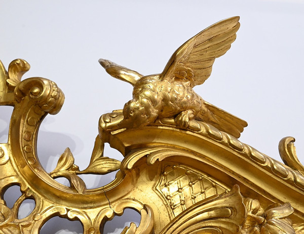 Important Miroir Louis XV en bois doré – Début XIXe