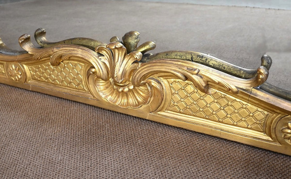 Important Miroir Louis XV en bois doré – Début XIXe