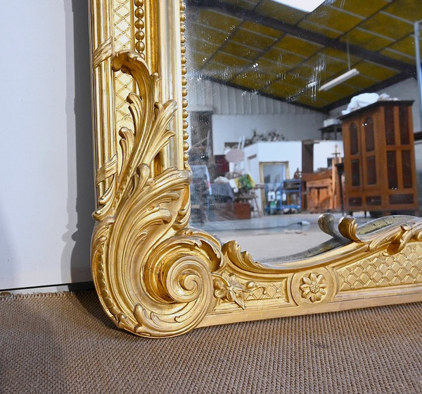 Important Miroir Louis XV en bois doré – Début XIXe