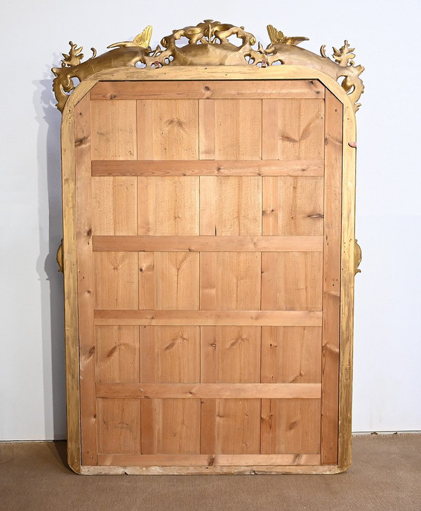 Important Miroir Louis XV en bois doré – Début XIXe
