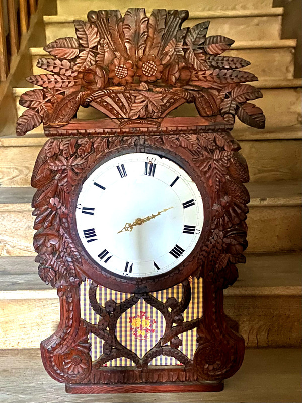 Richly carved in pine this lady's clock window from Upper Normandy, Cauchoise 18th