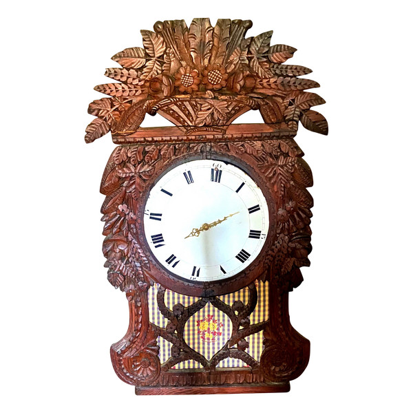 Richly carved in pine this lady's clock window from Upper Normandy, Cauchoise 18th