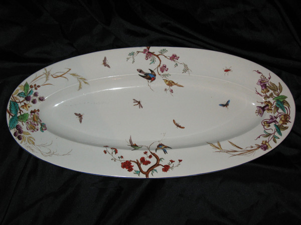 Table service in fine earthenware from Bordeaux, Nella decor with flowers and birds, 19th century