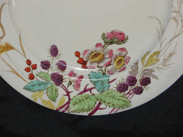 Table service in fine earthenware from Bordeaux, Nella decor with flowers and birds, 19th century