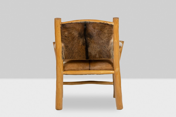 Brutalist armchair in elm and goatskin, 1970s