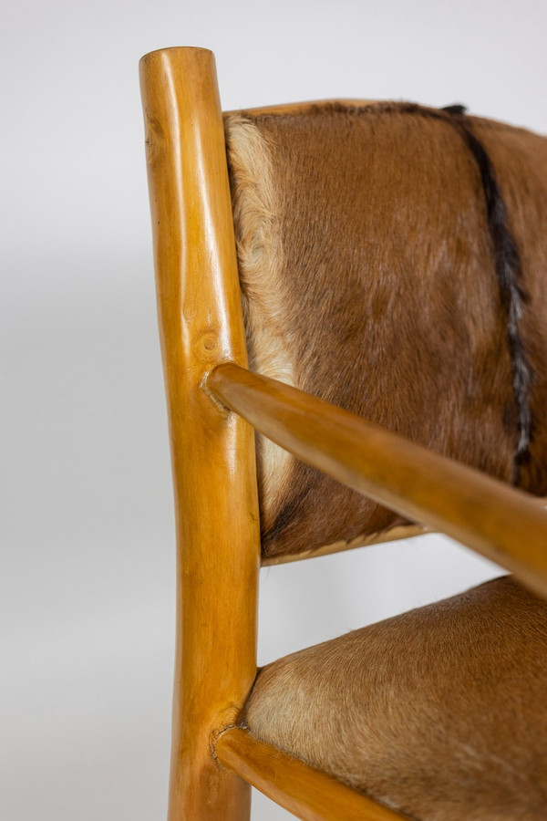 Brutalist armchair in elm and goatskin, 1970s