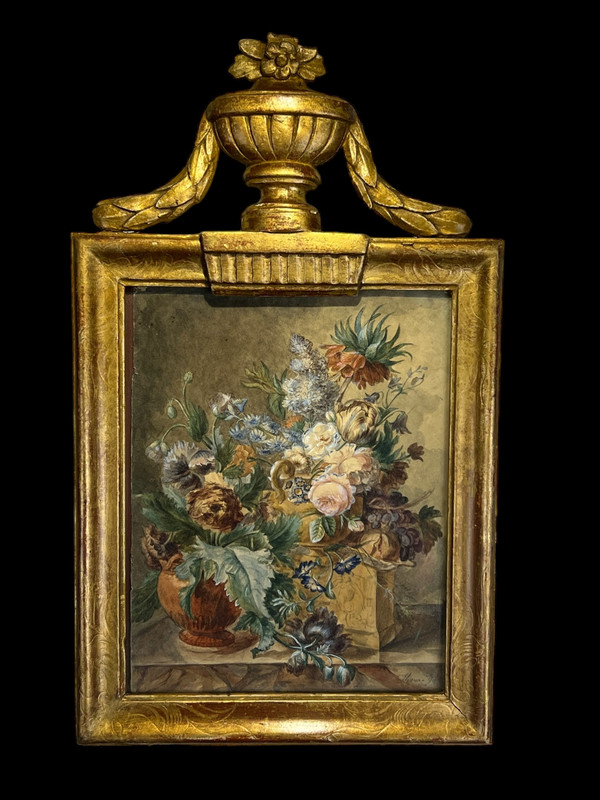 XVIIIth CENTURY FRAME IN SCULPTTED AND GILDED WOOD AND XVIIIth CENTURY AQUARELLE WITH SIGNED FLORAL DECOR