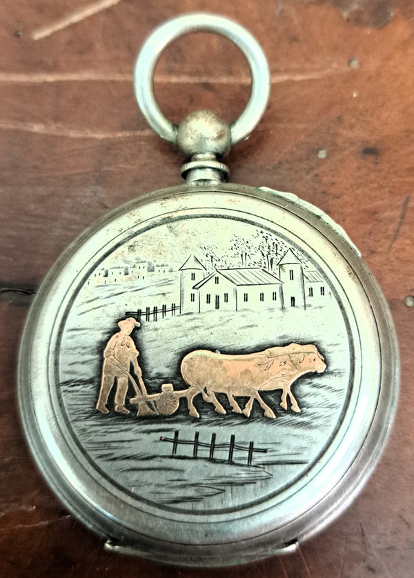 Taschenuhr mit ihrer silbernen Klappschatulle