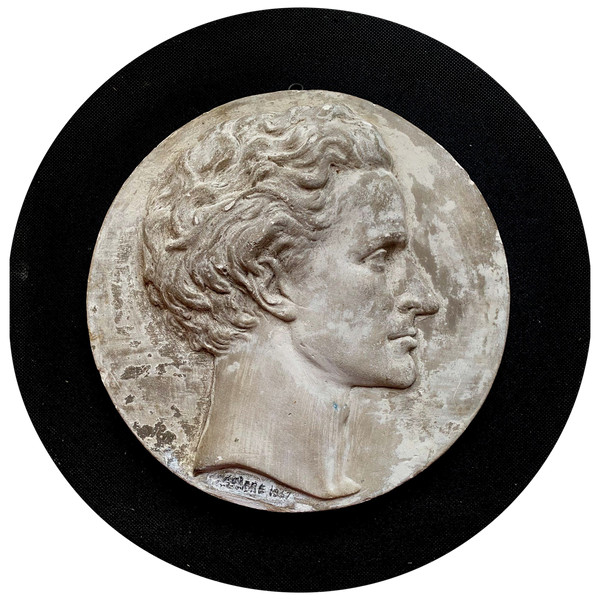 Profile of a man's head in plaster medallion from the Napoleon IIII period signed (Falguière label 1867)
