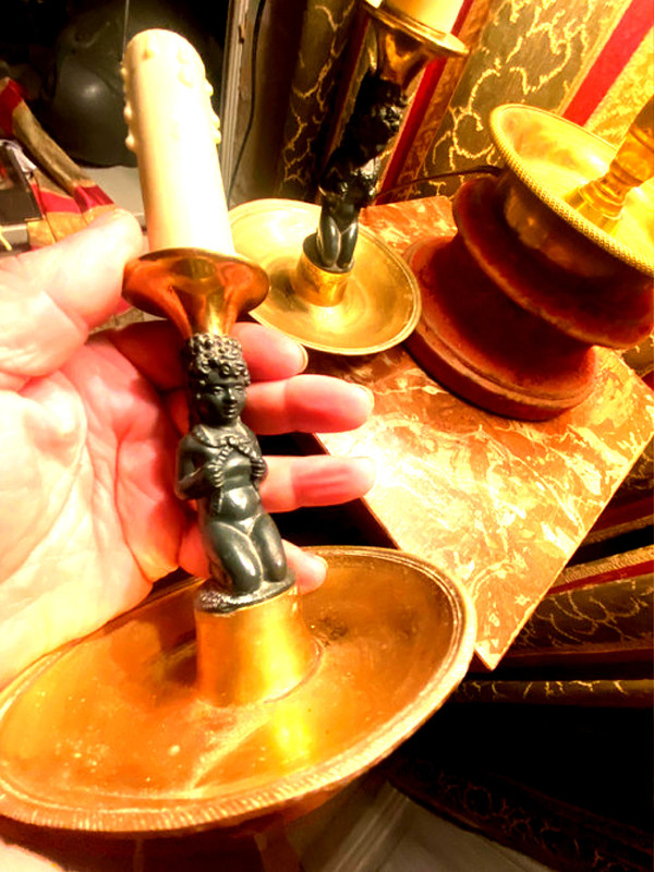Pair of charming Empire/Restoration style table candlesticks in gilded bronze and dark green patina