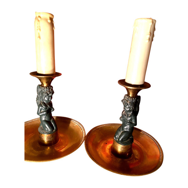 Pair of charming Empire/Restoration style table candlesticks in gilded bronze and dark green patina