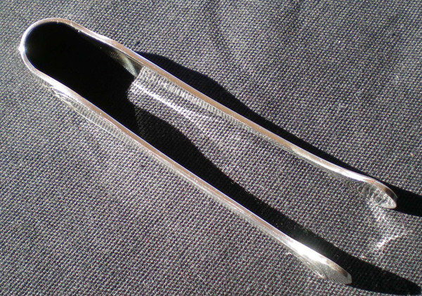 Pretty sugar tongs in silver metal model "Malmaison" Christofle goldsmith