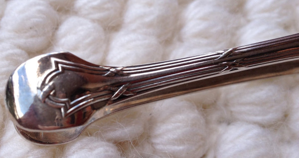 Silver metal sugar tongs model Ribbons goldsmith Christofle