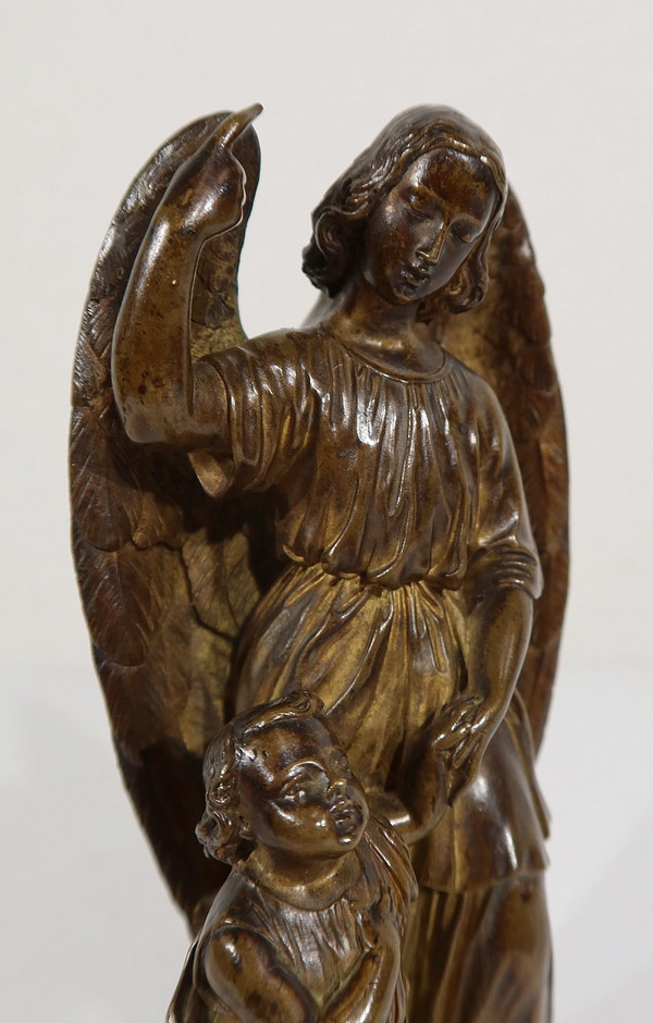 Bronzo patinato, “Bambino condotto da un angelo” – 1900