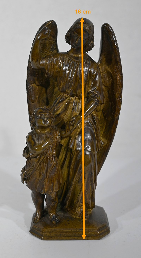 Bronzo patinato, “Bambino condotto da un angelo” – 1900
