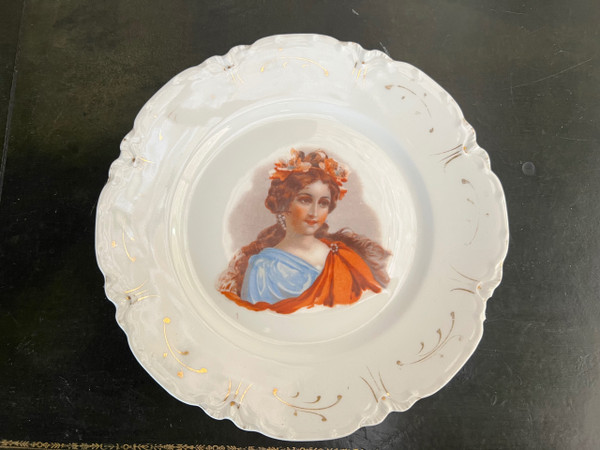 Set of Havilland porcelain plates decorated with women