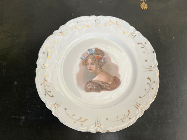 Set of Havilland porcelain plates decorated with women