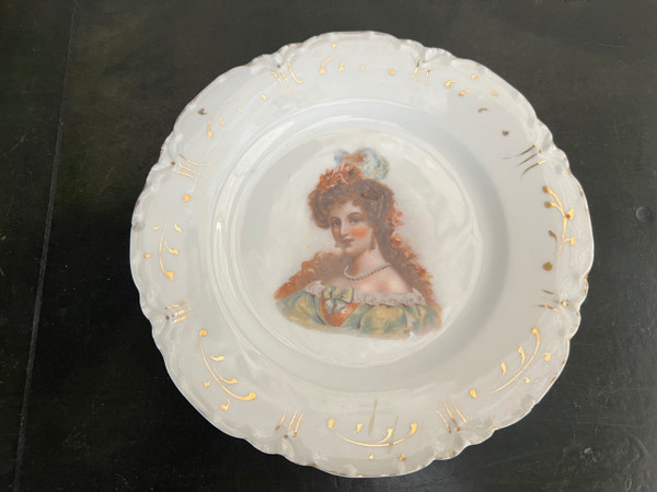Set of Havilland porcelain plates decorated with women