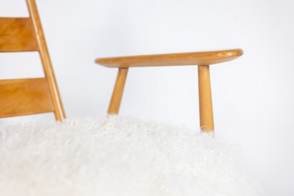 Pair of “lounge” armchairs in blond beech. 1950s