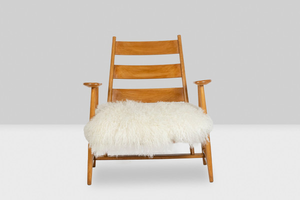 Pair of “lounge” armchairs in blond beech. 1950s