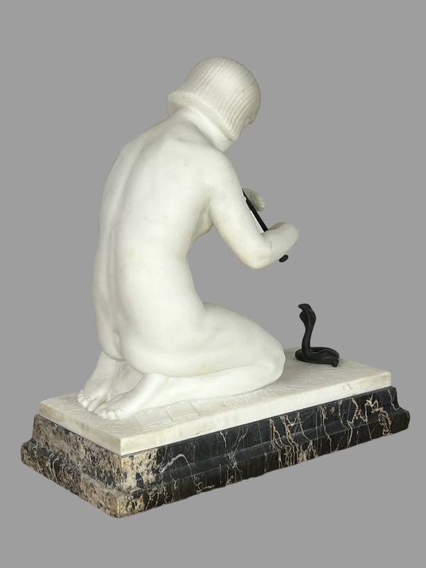 GUGLIELMO PUGI" SCULPTURE IN WHITE ART DECO MARBLE (SNAKE CHARMER)
