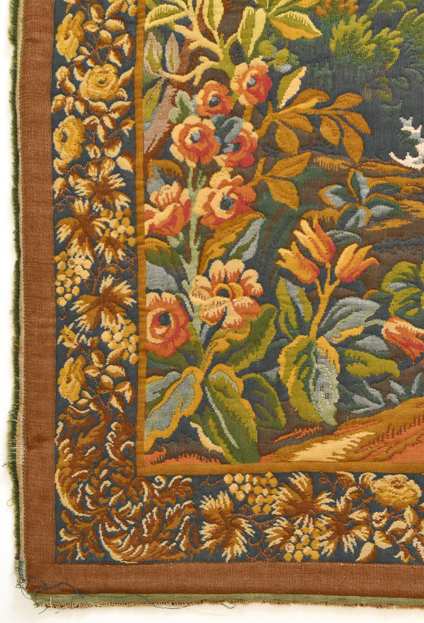 Tapestry depicting a green landscape