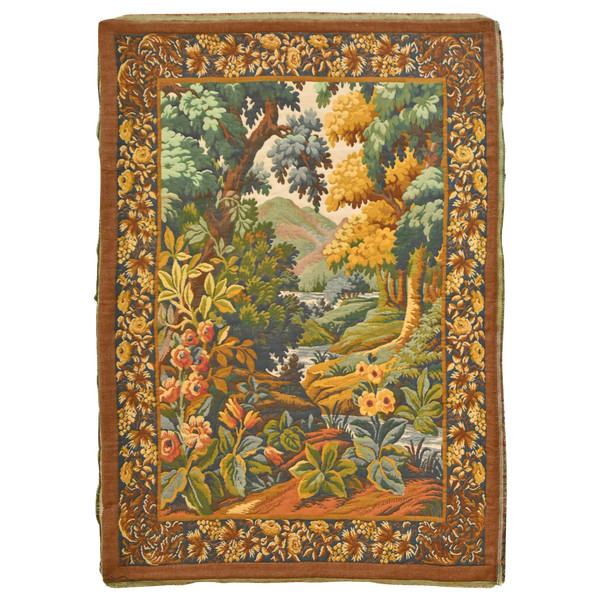 Tapestry depicting a green landscape