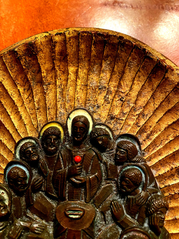 Decorative element featuring the image of Christ and his Apostles in patinated bronze with touches of colored enamel.