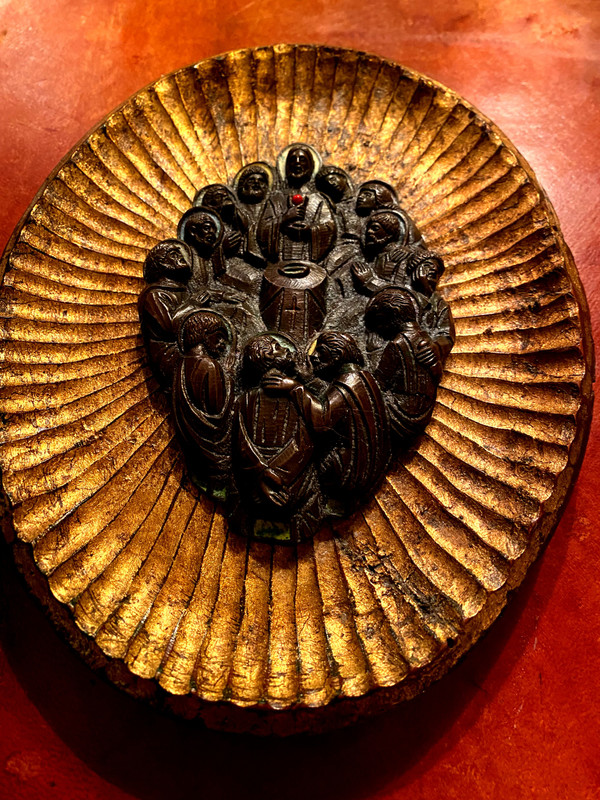 Decorative element featuring the image of Christ and his Apostles in patinated bronze with touches of colored enamel.