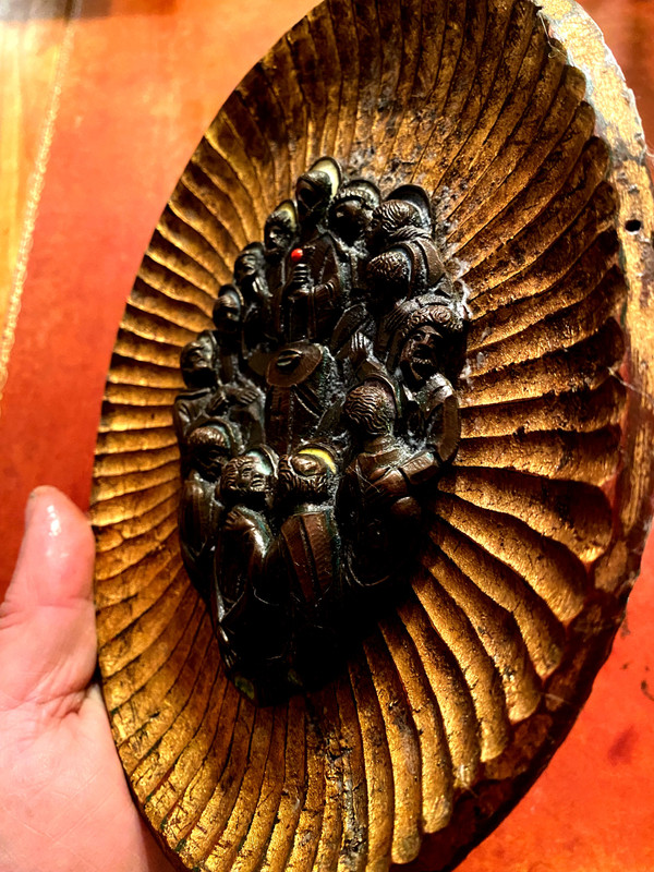 Decorative element featuring the image of Christ and his Apostles in patinated bronze with touches of colored enamel.