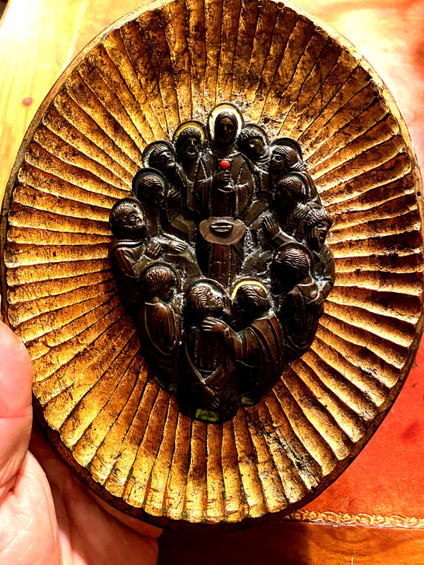 Decorative element featuring the image of Christ and his Apostles in patinated bronze with touches of colored enamel.