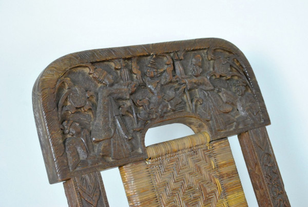 Sedia pieghevole in legno esotico intagliato e canna, Asia, Fine XIX/Inizio XX secolo