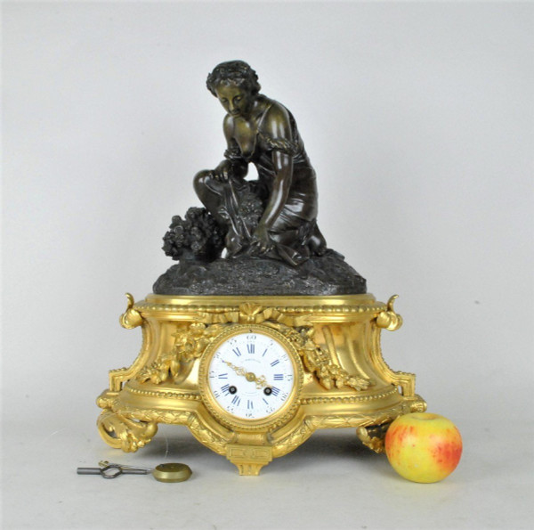 Orologio in bronzo, donna con fiori, Schenewerk, XIX secolo
