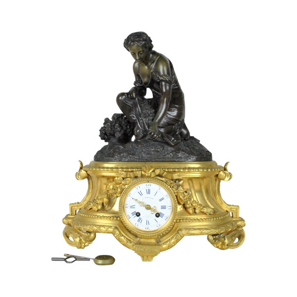 Orologio in bronzo, donna con fiori, Schenewerk, XIX secolo