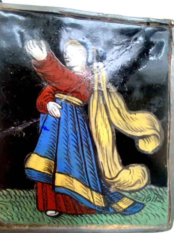 Small stained glass window from 1621 representing a woman dressed in her finery offering a present (early 17th century)