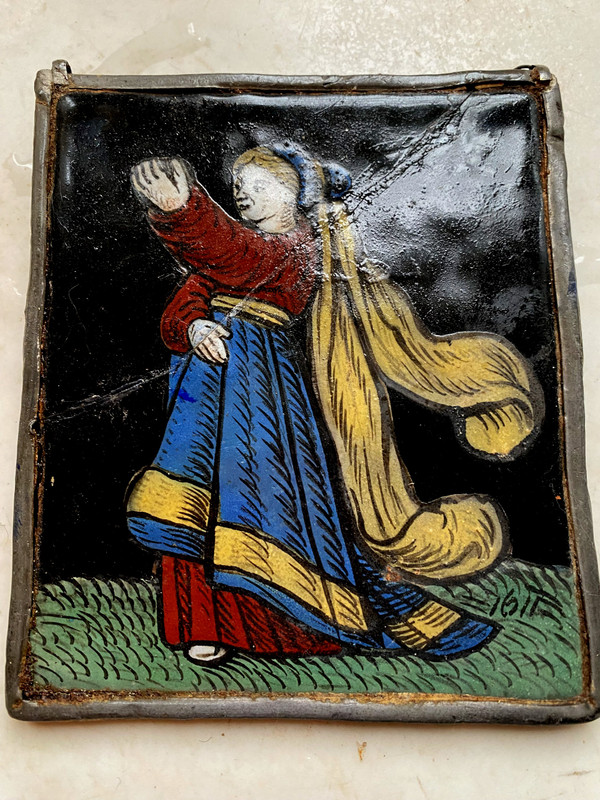 Small stained glass window from 1621 representing a woman dressed in her finery offering a present (early 17th century)