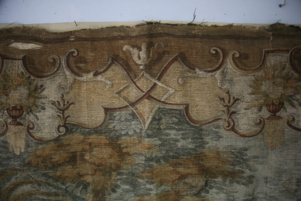 Grande toile peinte du XVIIIe, "la halte d'une caravane à un puits"