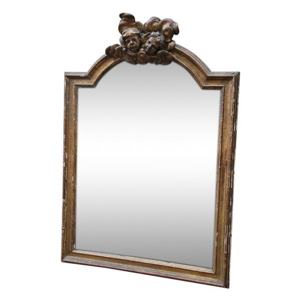 Specchio in legno dorato con teste d'angelo, XVIII secolo