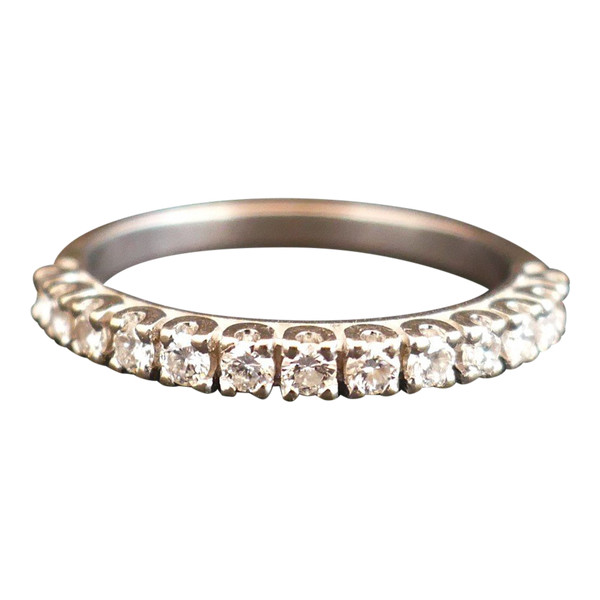 Halbdiamant-Ehering, 18 Karat Weißgold.
