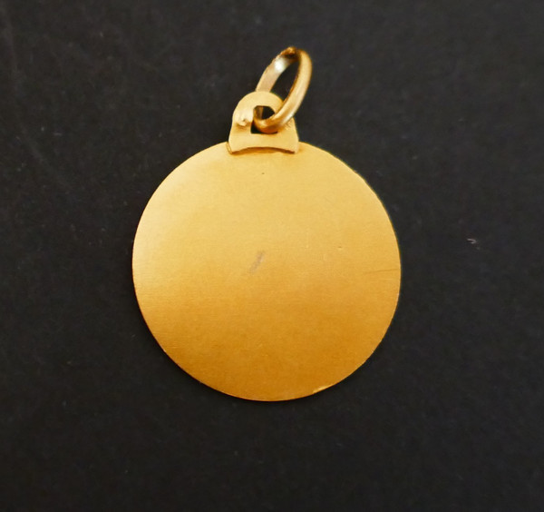 18 Carat Gold Virgin Medal.