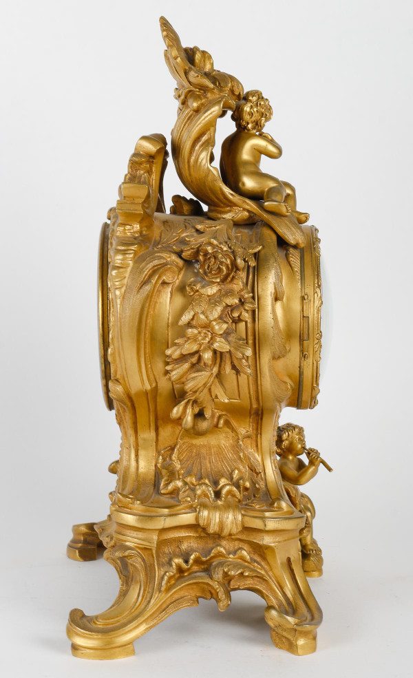 Eine Kamingarnitur aus vergoldeter Bronze Ende XIX.