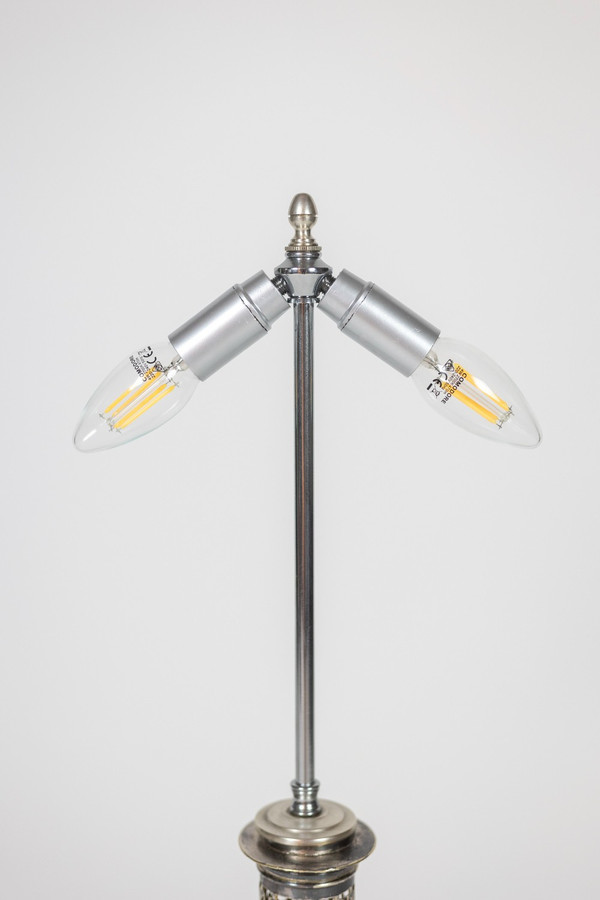 Coppia di lampade in metallo e bronzo argentato. 1880 circa