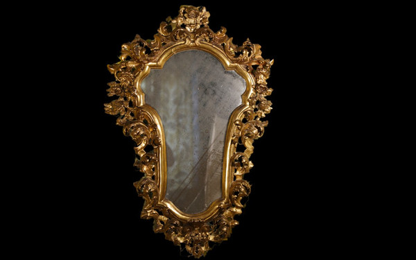  18th century Italian baroque mirror, gilded wood leaf