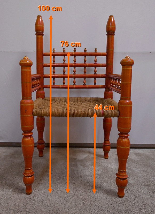 Poltrona in legno dipinto e corda intrecciata, India - Prima metà del XX secolo