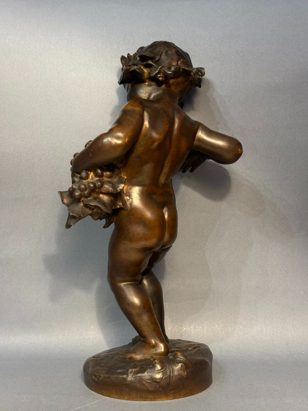 Bronzo Artdeco "Bacco bambino" firmato MALRIC
